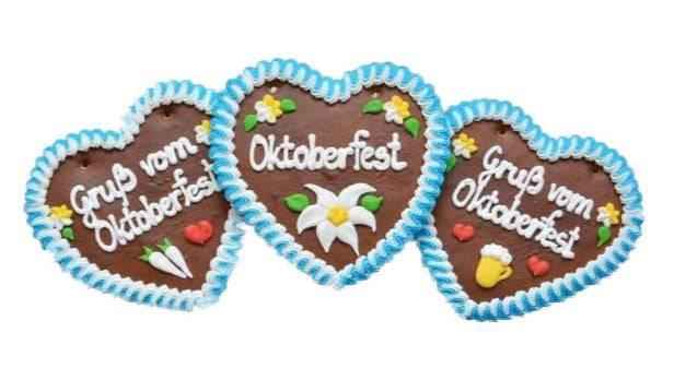 Handgemachtes Lebkuchenherz Gruß vom Oktoberfest – Weiß mit blauem Rand 17 cm