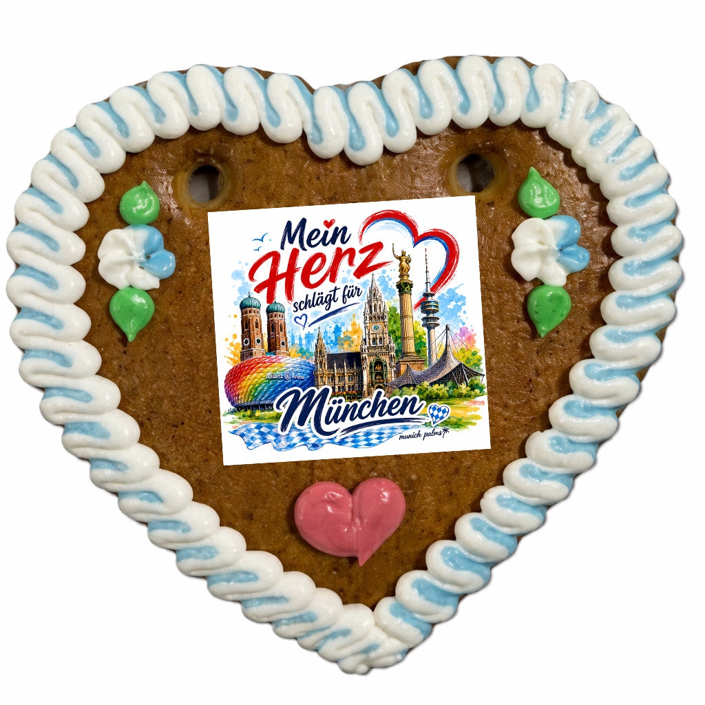 Lebkuchenherz von Lebkuchenherzen-Fabrik mit Aufleger „Mein Herz schlägt für München“ auf braunem Lebkuchenherz.