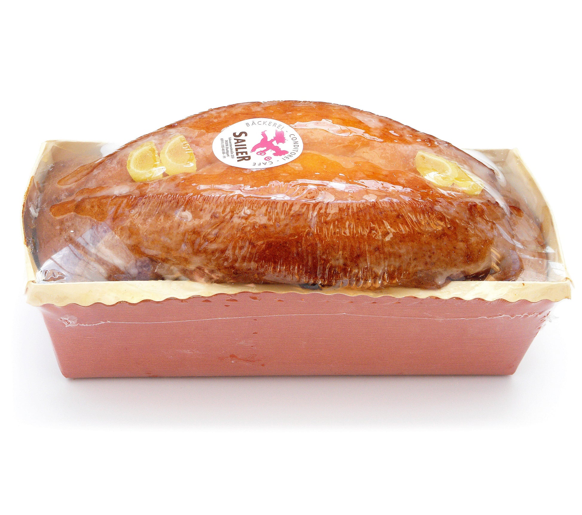 Feiner Zitronenkuchen aus den Backwaren der Bäckerei Sailer, frisch und saftig auf einem Teller präsentiert
